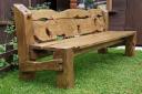 An example of the reclaimed oak crafted seating planned for the park area.