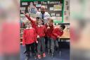Headteacher, Gary Anders, with a group of pupils