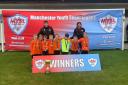 The winning Urmston Meadowside Falcons with coaches Adam Groves and Jessica Hawkins. Players, from left, are Oliver Clarkson, Sam Fornasier, Asa Gilli-Ross, Arlo Sibiga, Caleb Hanvey, Albie Groves, Louis Winn and Otto Hawkins