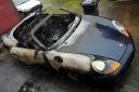 DESTROYED: A Porsche was burnt out in an arson attack in Cope Bank East Street in Bolton