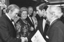 Theatre Trustee Mr T Warburton shakes hands with Prince Charles in the Octagon Theatre foyer. Photo by Bolton Evening News, December 14 1977. ...