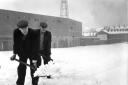 Bolton Wanderers' 1965 Snow.Plenty of shovel work for these men outside Burnden Park in January, 1965. Photo by Bolton Evening News, January 21, 1965...