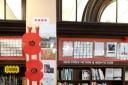CREATION: Ribbon of Poppies posters at Farnworth Library by Farnworth primary school children