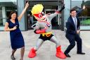 LIGHTNING! Leigh MP Andy Burnham, with Wigan MP Lisa Nandy and the charity mascot, the Duchenne Destroyer