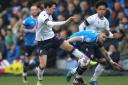 Kieran Lee in the thick of the action for Bolton against Peterborough United