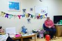 Healthcare assistant Laraine Scarle celebrating her 80th birthday at Royal Bolton Hospital
