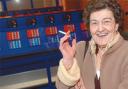 outdoor game: Ann Isherwood enjoys a cigarette by the outdoor bingo machines