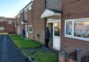 CANVASSING: Labour campaigners knocking on doors in the Brocksby Chase estate in Bolton North East