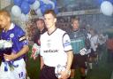 Gudni Bergsson leads Bolton out on their Premier League return in 2001