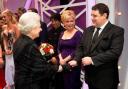 ROYAL APPOINTMENT: Peter Kay meets the Queen as fellow performer Bette Midler looks on
