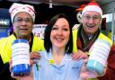 CHRISTMAS COLLECTION: Sue Irwin from Marie Curie with Bolton Rotary Club members, Arup Banerjee, left, and Norman Parker at Sainsburys store in Trinity Street, for the Bolton Rotary Club’s Christmas collection