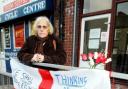 GRIEF: Kathleen Rankin at the roadside memorial on Blackburn Road, Bolton, in memory of her son, Christopher