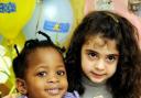 Pots of fun: Michelle Makeleni, left, and Alicia Guaiana, both aged three