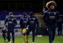 Marlon Fossey, right, warms up with the Wanderers players at Hartlepool