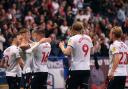 Wanderers celebrate the winning goal from Conor Bradley against Morecambe