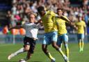 Bolton Wanderers' Kyle Dempsey under pressure from Sheffield Wednesday's Tyreeq Bakinson