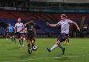 Wanderers striker Jon Dadi Bodvarsson shoots for goal against Leeds United's Under-21s.