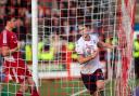 Kieran Lee grabs the ball after scoring Bolton's second goal at Accrington Stanley