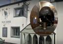 The skull, inset, which is in the bar at The Pack Horse pub in Affetside