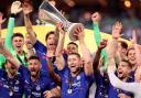 Gary Cahill lifts the Champions League trophy with Chelsea in 2019