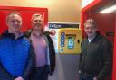 Alun Wall, Jez Jarratt, and Phil Wykes from Bolton Orthopaedics with the newly installed defibrillator