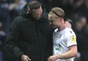 Bolton Wanderers manager Ian Evatt greets Bolton Wanderers' Kyle Dempsey