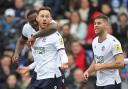 Bolton Wanderers' Ricardo Santos celebrates scoring his side's first goal with Gethin Jones