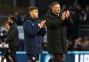 Dion Charles and Ian Evatt applaud the away fans after defeat to Wycombe