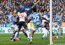 Victor Adeboyejo scores the equalising goal for Bolton against Port Vale.
