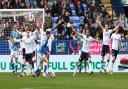 Bolton Wanderers' (left to right) Conor Bradley Ricardo Santos Randell Williams and Aaron Morley appeal to the referee