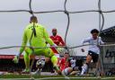 Bolton Wanderers' Shola Shoretire shot is saved by Morecambe's Connor Ripley