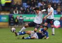 Bolton Wanderers' Shola Shoretire is fouled by Ipswich Town's Massimo Luongo