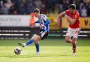 Sheffield Wednesday's George Byers and Charlton Atheltic's Scott Fraser (right) battle for the ball during the Sky Bet League One match at The Valley.
