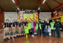 Firefighters at Leigh Fire Station, Darren's family and GMP officers on the day