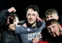 James Trafford celebrates with Wanderers fans after the semi-final win against Accrington.
