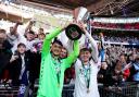 James Trafford and Conor Bradley lift the Papa Johns Trophy in April at Wanderers