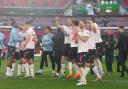 Wanderers players celebrate their Papa Johns Trophy win at Wembley