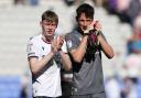 Conor Bradley and James Trafford say farewell to the Bolton Wanderers fans