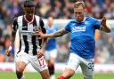 Keanu Baccus, left, in action against Rangers' Scott Arfield