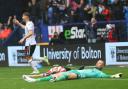 Dion Charles races away after Bolton's third goal of the day against Lincoln