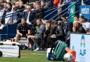 Ian Evatt looks on in Wanderers' 4-0 defeat against Wigan