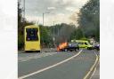 Emergency services rush to scene of collision between car and bus