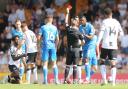 Ross Joyce shows a red card to Bolton captain Ricardo Santos during the 0-0 draw at Port Vale in August 2022