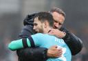 Jack Iredale gets a hug from manager Ian Evatt after the win at Port Vale