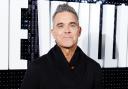 Robbie Williams abruptly left Take That and started a solo career a year later
