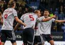 Kyle Dempsey celebrates scoring Bolton's sixth goal against Exeter City