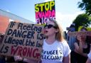 Demonstrators against the Rwanda policy at a removal centre  (Victoria Jones/PA)