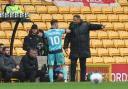 Bolton Wanderers boss Ian Evatt issues some instructions to striker Dion Charles