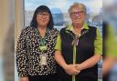 Customer trading manager Carol (right) with petrol kiosk colleague  Chrissy