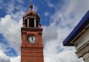 The clock tower outside Bolton Interchange